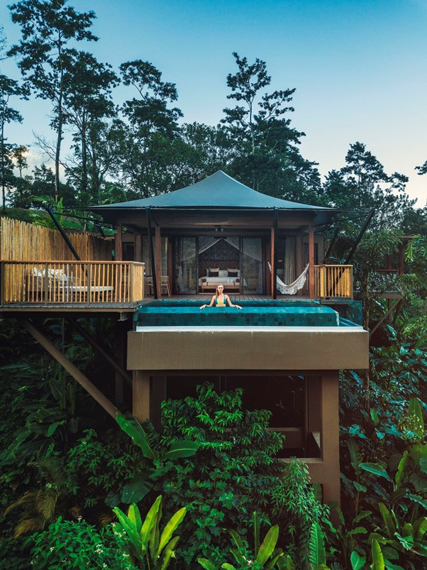 Luxury glamping unit with an architectural tensile fabric roof