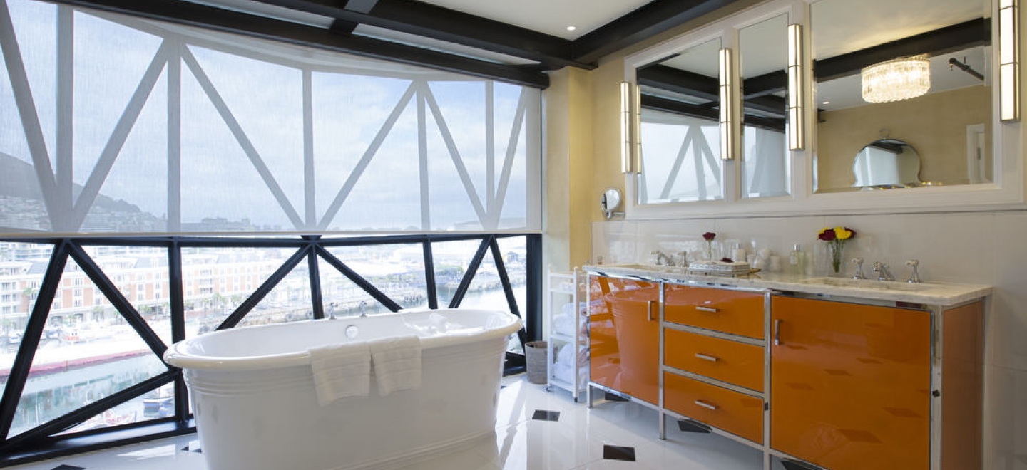 Solar protection blinds used in the bathrooms at the Silo Hotel offer translucency and heat protection