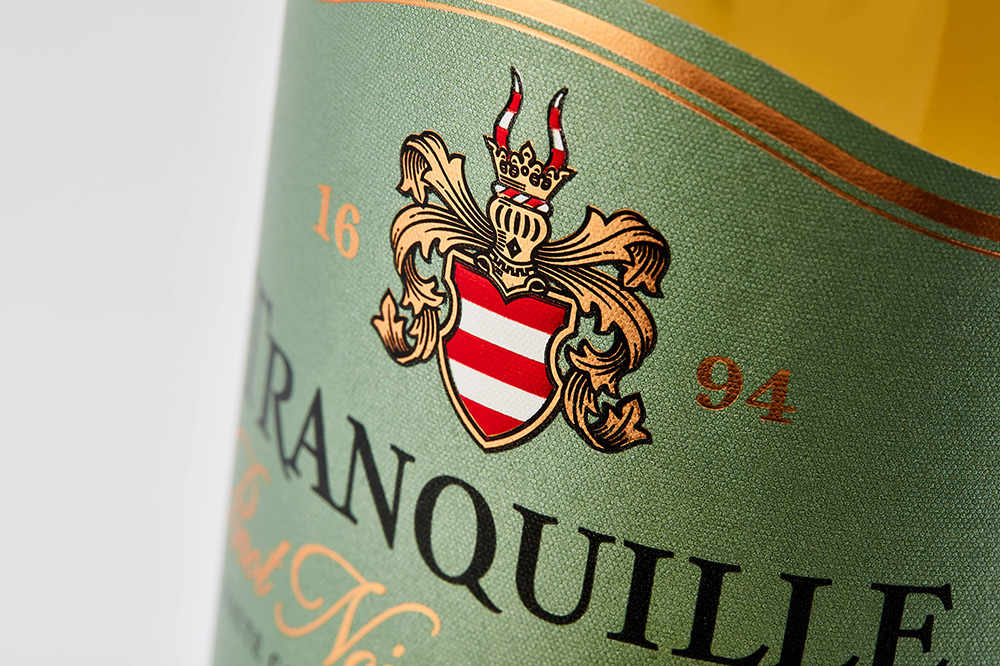 Wine label with foil enhancements to catch the eye of consumers