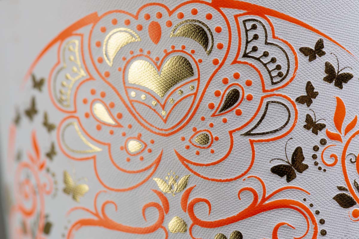 A close up view of foiling use on a printed wine label